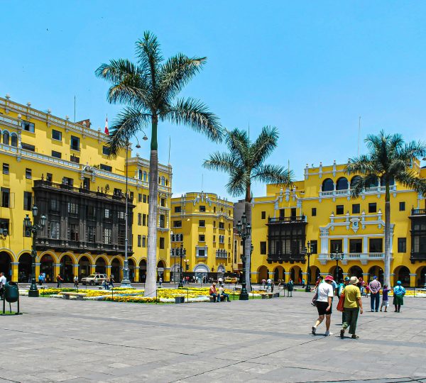 People Walking past the Plaza Mayor Peru